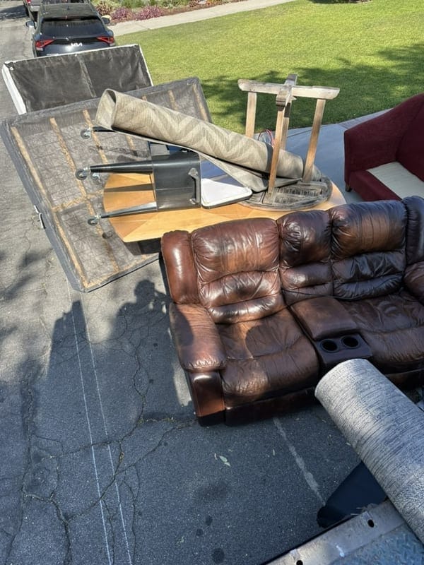 Sofa loaded for removal, Furniture straight onto the truck
